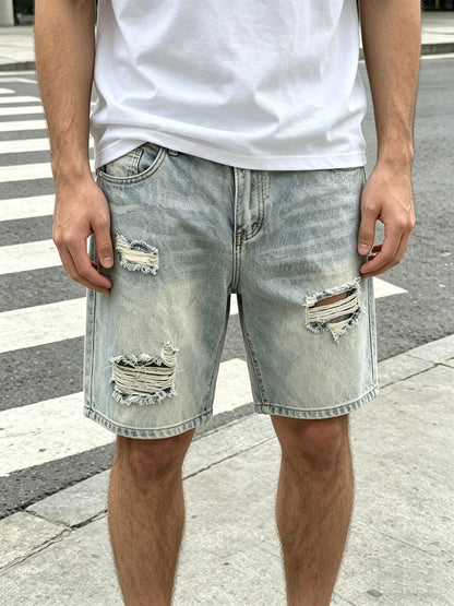 Bermudas Jeans com Lavagem Clara Detalhes Rasgados